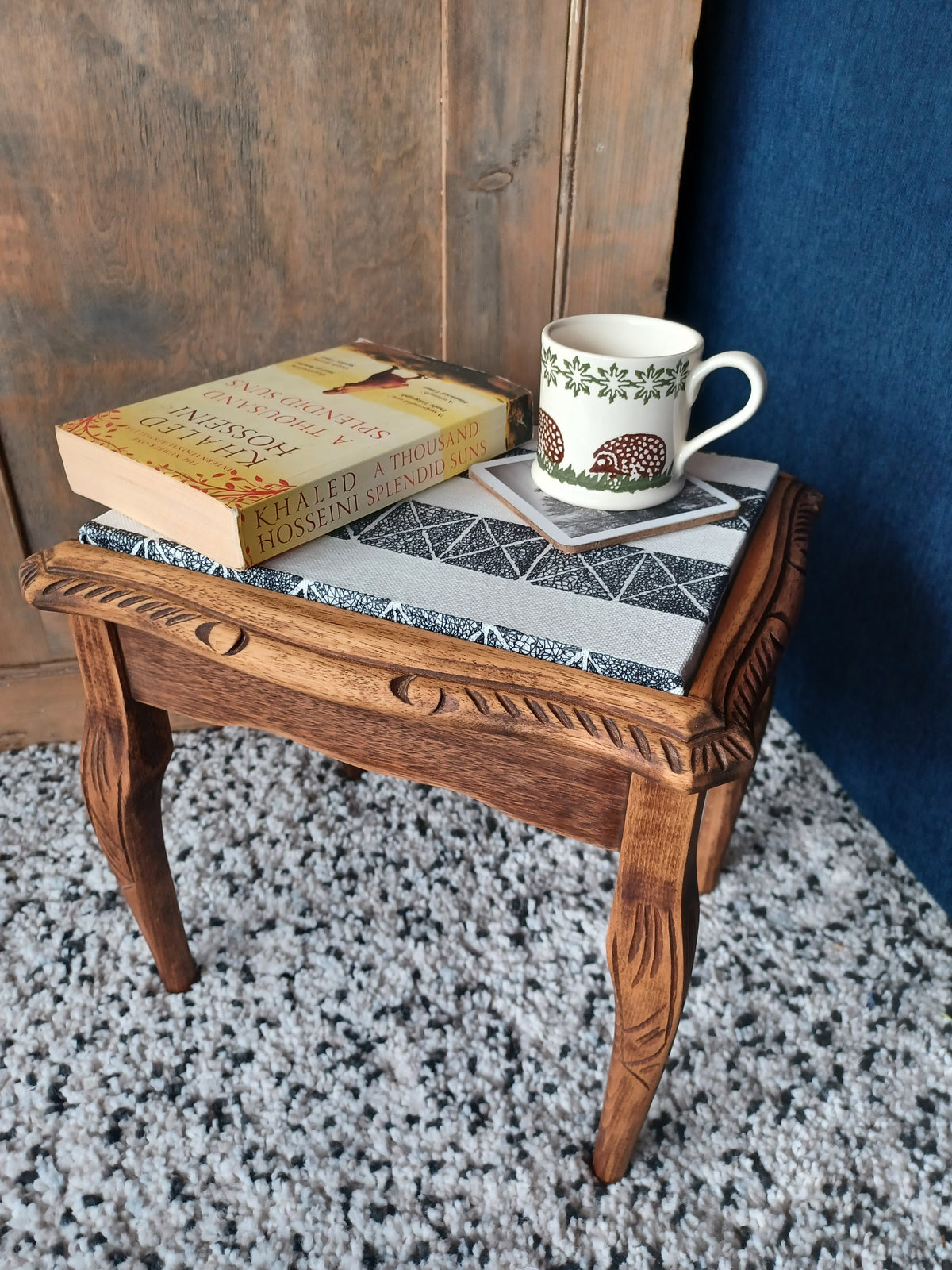 Small wooden side table with découpage fabric top