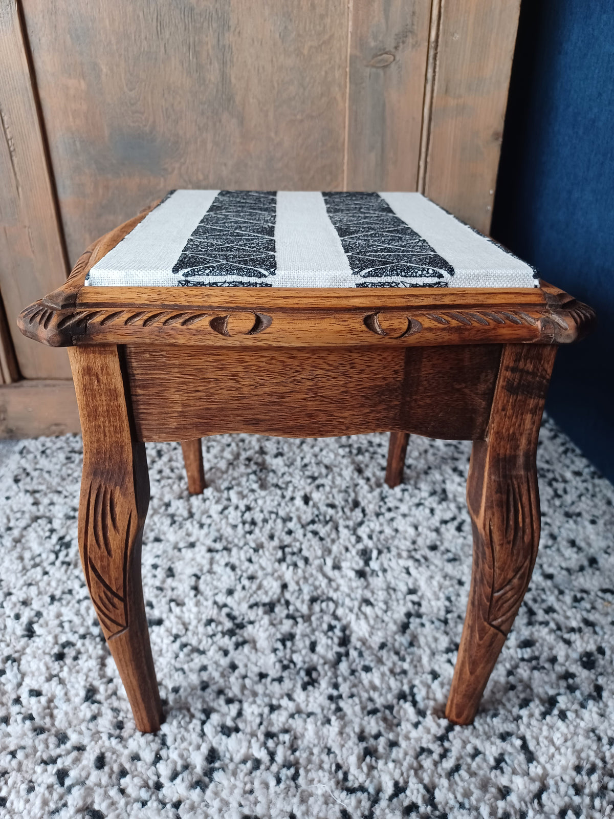 Small wooden side table with découpage fabric top