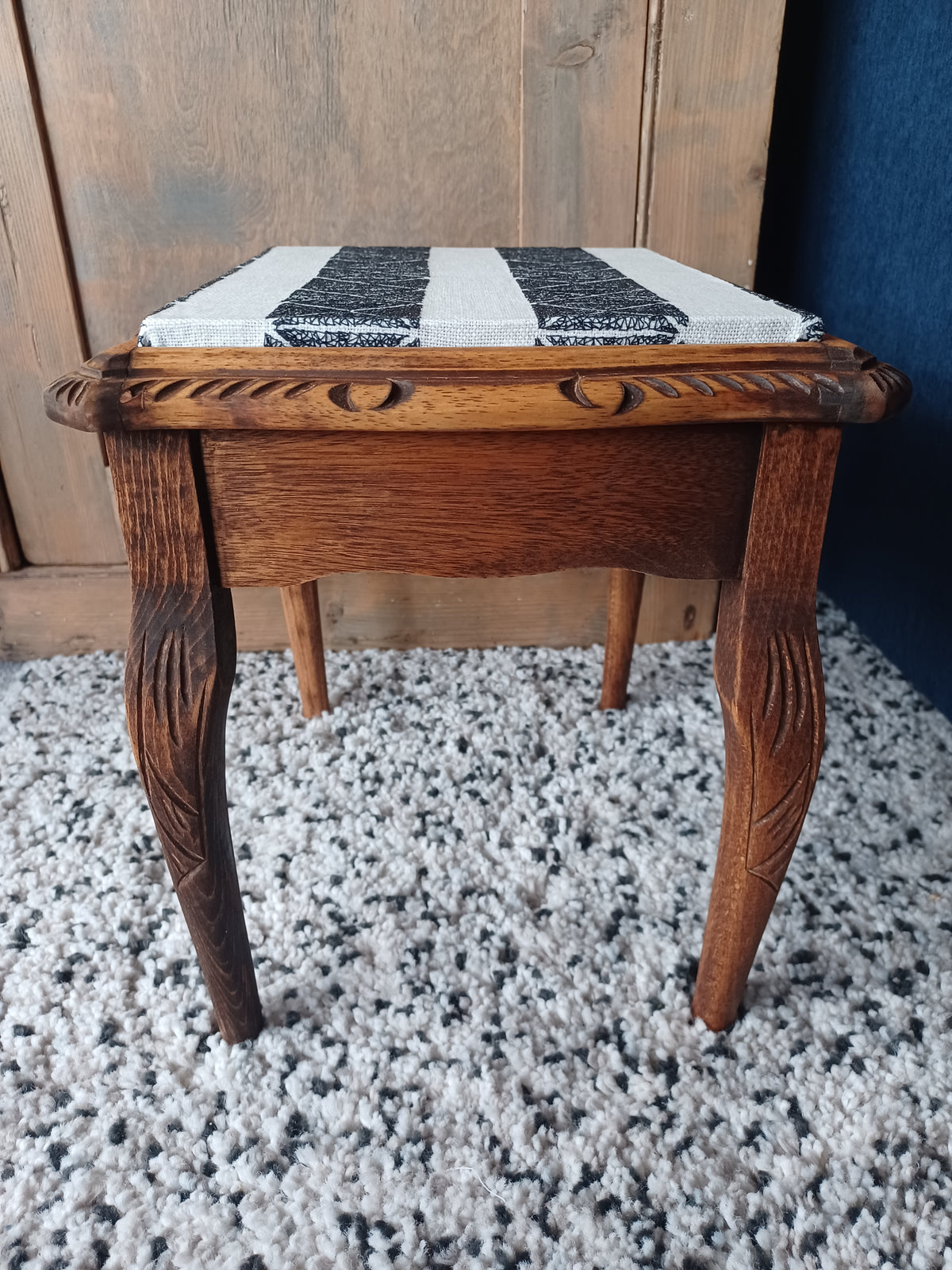 Small wooden side table with découpage fabric top